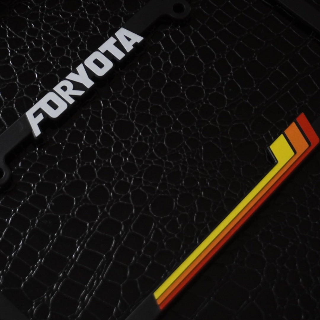 close up photo of vintage heritage stripes license plate frame for toyota by FORYOTA