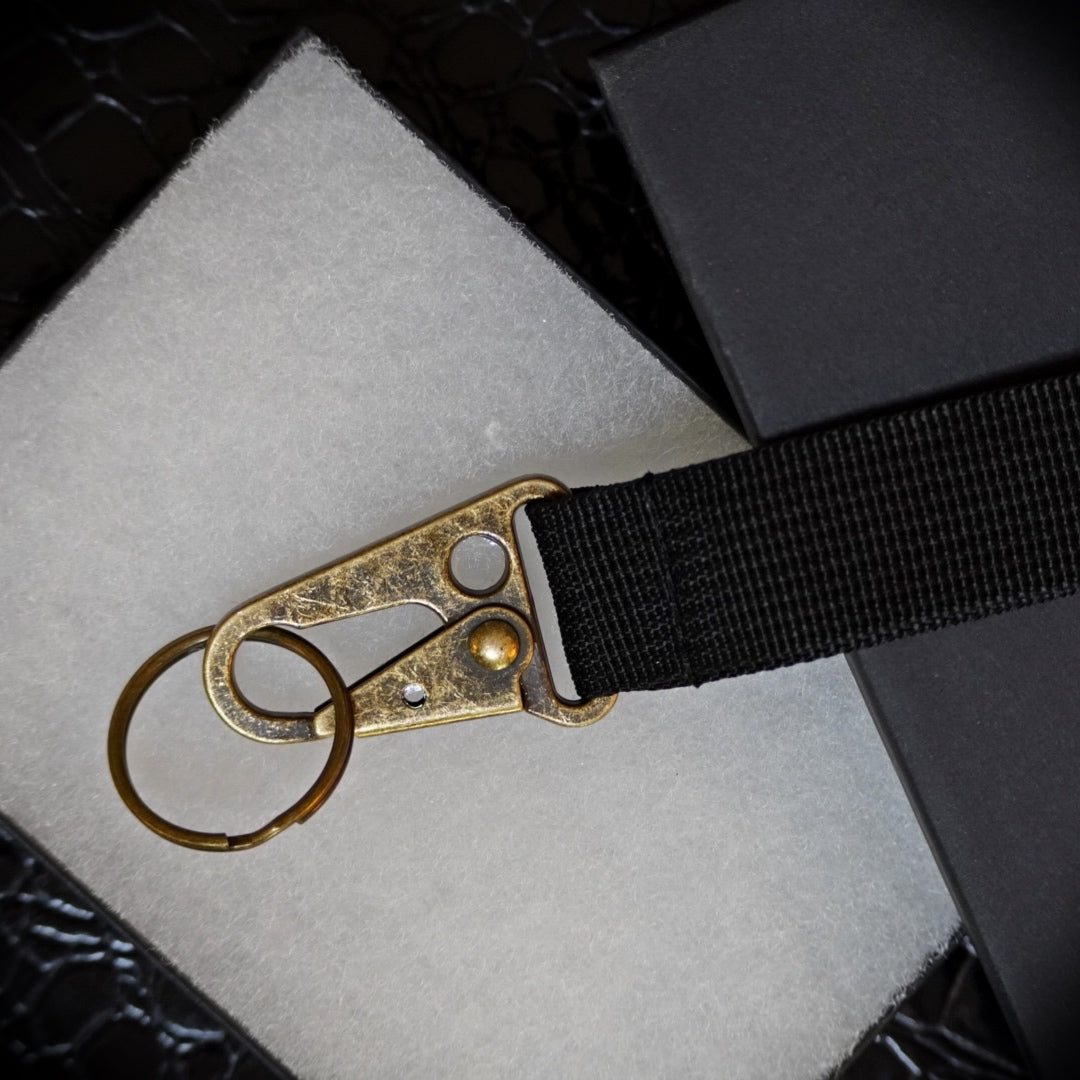 brass clip black wrist lanyard car keychain